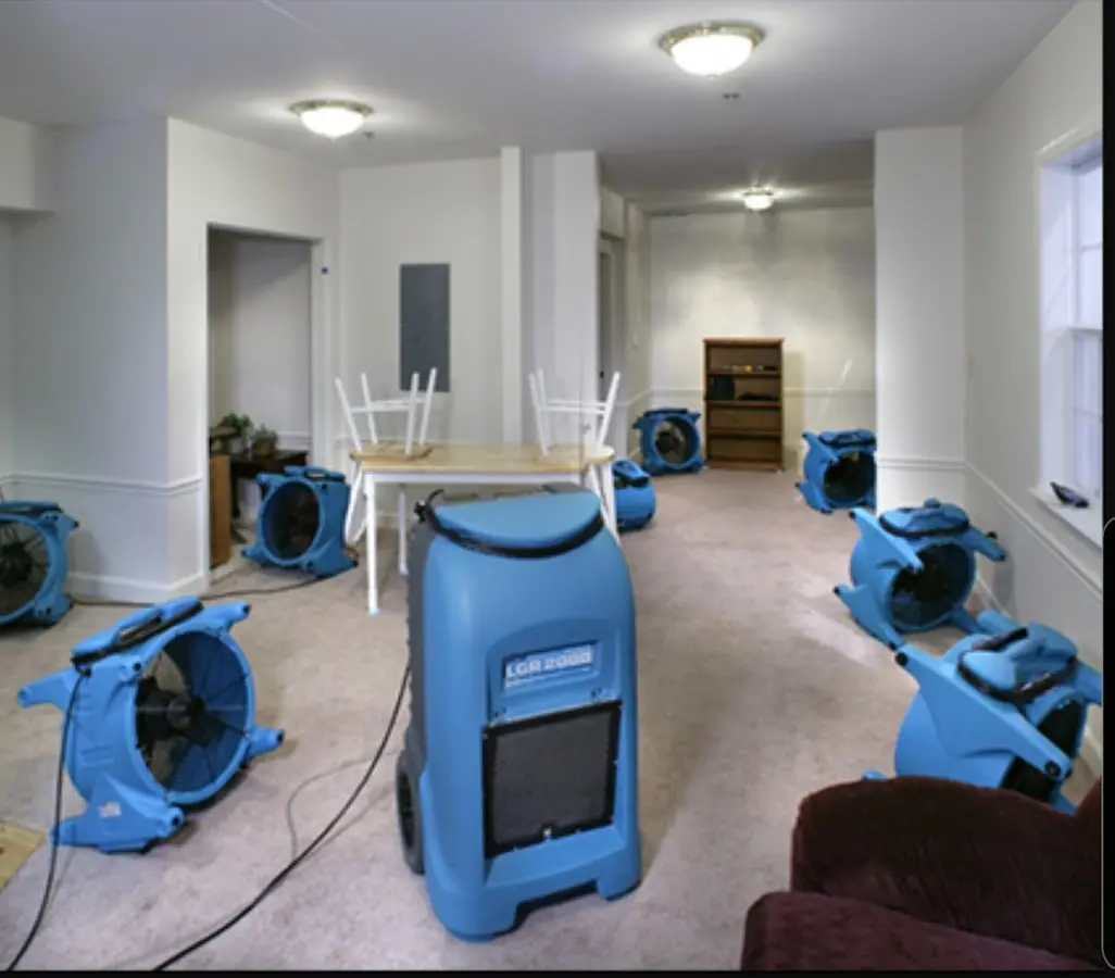 Air movers and dehumidifier setup for Water Damage Restoration in Coral Terrace